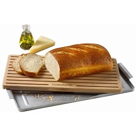Click here to buy Calphalon 18-by-9-by-3 4-Inch Bread Cutting Board with Aluminum Crumb Tray by Calphalon.