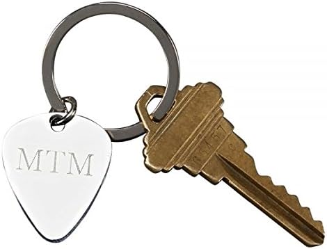 Guitar Pick Shaped Key Chain perfect gift for the music lover in your life! Get yours today guiter gear, guiter buddy.