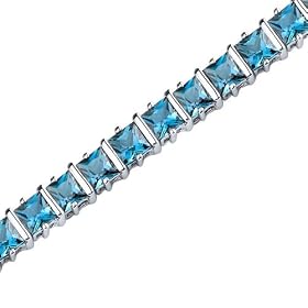 Gracefully Impressive: 13.25 carats total weight Princess Cut London Blue... by