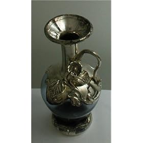 Decorative Bottles, Vases,Mouth Blown Glass ,sculptured Bottles made of Glass and Silver by king solomon finds