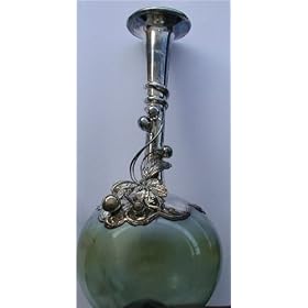 Decorative Bottles, Vases,Mouth Blown Glass ,sculptured Bottles made of Glass and Silver by king solomon finds