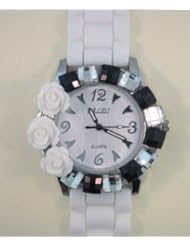 White Watch with Three Roses and Black and White Square Crystals Around Face. Silicone Rubber Gel Watch Link Look Ceramic Style Band. Color of Roses Coordinates with Band Color. Handles are Glow in the Dark.