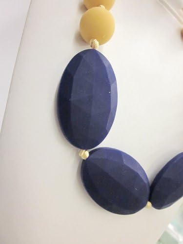 Chewable Teething Necklace for Teething Babies or Nursing Moms. Strand of 14mm Mustard Yellow Beads with 3 Faceted Plum Oval Beads in Center. Cord Is Knotted Between Each Beaded for Added Safety. Soft Silicone Food Safe Beads. BPA Free Non Toxic. Gift Box Included for Easy Gift Giving