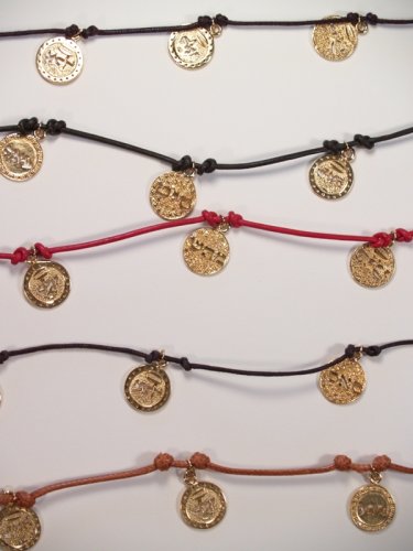 8 names of God coins dipped In Gold on a leather bracelet