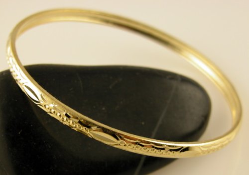 Click here to buy 18K Gold Filled Womens Diamond-Cut Bangle Bracelet - X-Small.