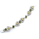 The Demeter Collection- Harvest 5- A Marvelous Love Hearts Bracelet With A Bounty Of Pink, Yellow, And White Gold. Set With Hunter Green Chrome, Yellow Sapphires And Accented With Diamonds Also With Hand Crafted Filigree Galleries