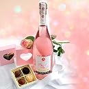 Valentinstag Geschenk Prosecco Pralinen in rosa Herzbox