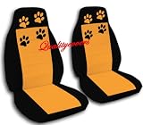 2 black and orange car seat covers with paw prints for a 2009 Chevy Cobalt. Airbag friendly