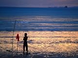 Boy Playing Goal Keeper in Soccer Game on Beach, Ao Nang, Krabi, Thailand Photographic Poster Print by Glenn Beanland, 40x30