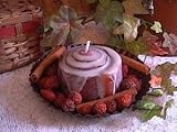Cinnamon Bun on Plate with Fixens Soy Wax Candle