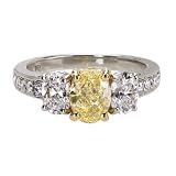 Platinum and 18k Yellow Gold Fancy Intense Yellow Oval Cut Diamond Ring (GIA Certified 1.31 ct center, 2.67 cttw), Size 6