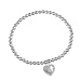 Sterling Silver Tarnish Free 4mm Bead Stretch Bracelet with Heart and Cut-Out Cross and Faith Charm, 7.5
