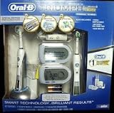 Oral-B Triumph Professional Model Care 9950 Toothbrush System - INCLUDES 2 Wireless SmartGuides, 2 Handles and 3 Brush Heads, PLUS a Base and Travel Case