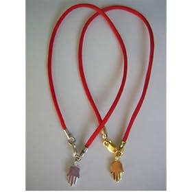 Click here to buy One of a Kind Hamsa Bracelet by One of a Kind.