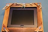 Voclan 8screen by SHARP.Includes rustic wood frame with SOUTH WEST accents.The ONLY ONE that fits most 8x10 picture frames so you can change the look later.Play MP3  Video in stereo Includes US shipping for limited time