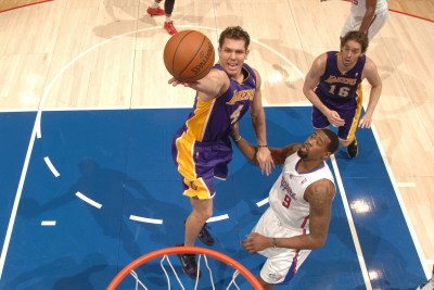 Los Angeles Lakers v Los Angeles Clippers: Luke Walton and DeAndre Jordan Photographic Poster Print by Noah Graham, 12x18