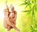 Beautiful Young Woman with Green Bamboo Leaves - 24"W x 21"H - Peel and Stick Wall Decal by Wallmonkeys