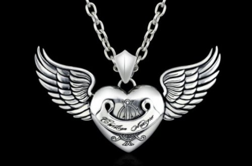 Christian Audigier Heart Pendant with Fully Outstretched Wings and both CA Logo and Ribbon across Heart all in Sterling Silver