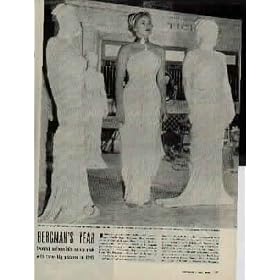 INGRID BERGMAN'S YEAR - On set of a weird dream sequence in "SPELLBOUND", Ingrid Bergman stands in statuesque pose and dress between blank-faced plaster models. ..... 1945 LIFE Magazine Picture, A4044A.