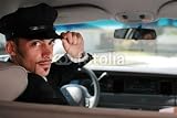 Wallmonkeys Peel and Stick Wall Decals - Handsome Male Chauffeur Sitting in a Car Saluting a Viewer - Removable Graphic