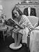 Debutante Ann Lincoln Reading While She Soaks Her Feet Photographic Poster Print