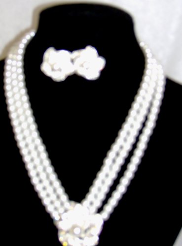 Click here to buy Three Strand White Pearl Choker Necklace with Diamel and Pearl on Sterling Silver Locket and....