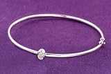 14K White Gold Bangle Bracelet With Diamond Accented Oval.