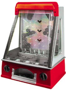 Childrens Toyshop  Used : Penny Pusher. Drop the penny at just the right time & get your reward.