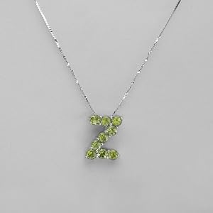 Necklace With 2.70ctw Genuine Peridots Made of 925 Sterling silver. Total item weight 5.0g Length 16in