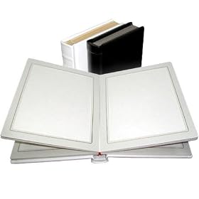 Click here to buy Adorama Pro Photo Album, Black Leatherette Cover with Library Bound Off White Pages, Holds... by Adorama.