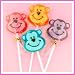 12 Frosted Monkey Face Lollipops Image