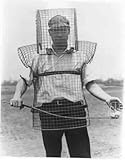 Photo Golf Caddie in Safety Device c1930