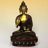 Buddha Statue with Red Stain