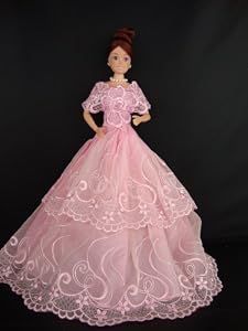 A Pink Lace Dress with Lace Covering the Shoulders Complete with Veil and Gloves Made to Fit the Barbie Doll