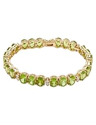 14K Yellow Gold 29.83 CTW Peridot and 1.17 CTW Color H-I SI3 Diamond Ladies Bracelet. Length 7.25 in. Total Item weight 22.7 g.