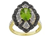 10KT 1.70CT PERIDOT AND .21CTW WHITE AND IRRADIATED BLACK DIAMOND RING