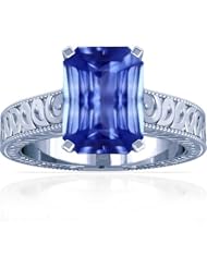 18K White Gold Emerald Cut Blue Sapphire Fana Designer Ring