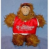 Vintage Alf Puppet wearing a red hat and red Orbiters jersey