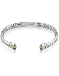 Sterling Silver This sterling silver peridot Sara Blaine bangle bracelet is sure to add a touch of sophisticated style to any outfit.