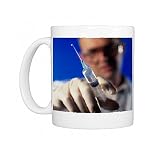Doctor gently squeezing a syringe Photo Mugs