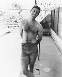 Richard Chamberlain 12x16 Matte B&W Photo (Wearing Shorts)