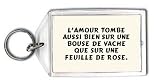 L'amour tombe aussi bien sur une bouse de vache que sur une feuille de rose. Porte Clé