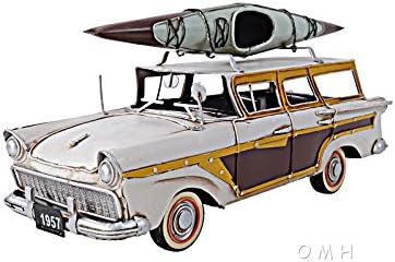 Automobile, FORD'S WOODY-LOOK COUNTRY SQUIRE W/ KAYAK. 13.5L x 5.5W x 6.5H Inches, Travel back in time with this classic 1957 Ford Woody-look Country Squire model. The best selling American made wagon of its time.