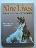 Nine lives : a year in the life of a cat family