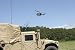 A Uh-1n Helicopter Flies over the Marine Air Support Squadron Compound. - 48"W x 32"H - Peel and Stick Wall Decal by Wallmonkeys