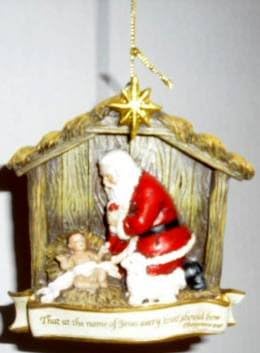 Kneeling Santa with Creche Christmas Ornament