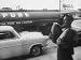 Planning a Treat, an Immigrant Juggles Two Watermelons as He Heads Home Form the Supe...