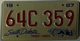 South Dakota 1987 License Plate White back ground with Mt Rushmore