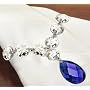 Set of 4 Crystal Napkin Rings with Blue Crystal Pendant