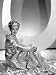 Artists and Models Abroad, Joan Bennett Wearing Gold Lame Negligee Designed by Edith ...